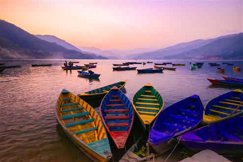 twilight with boats on Phewa lake, Pokhara, Nepal (Custom).jpg